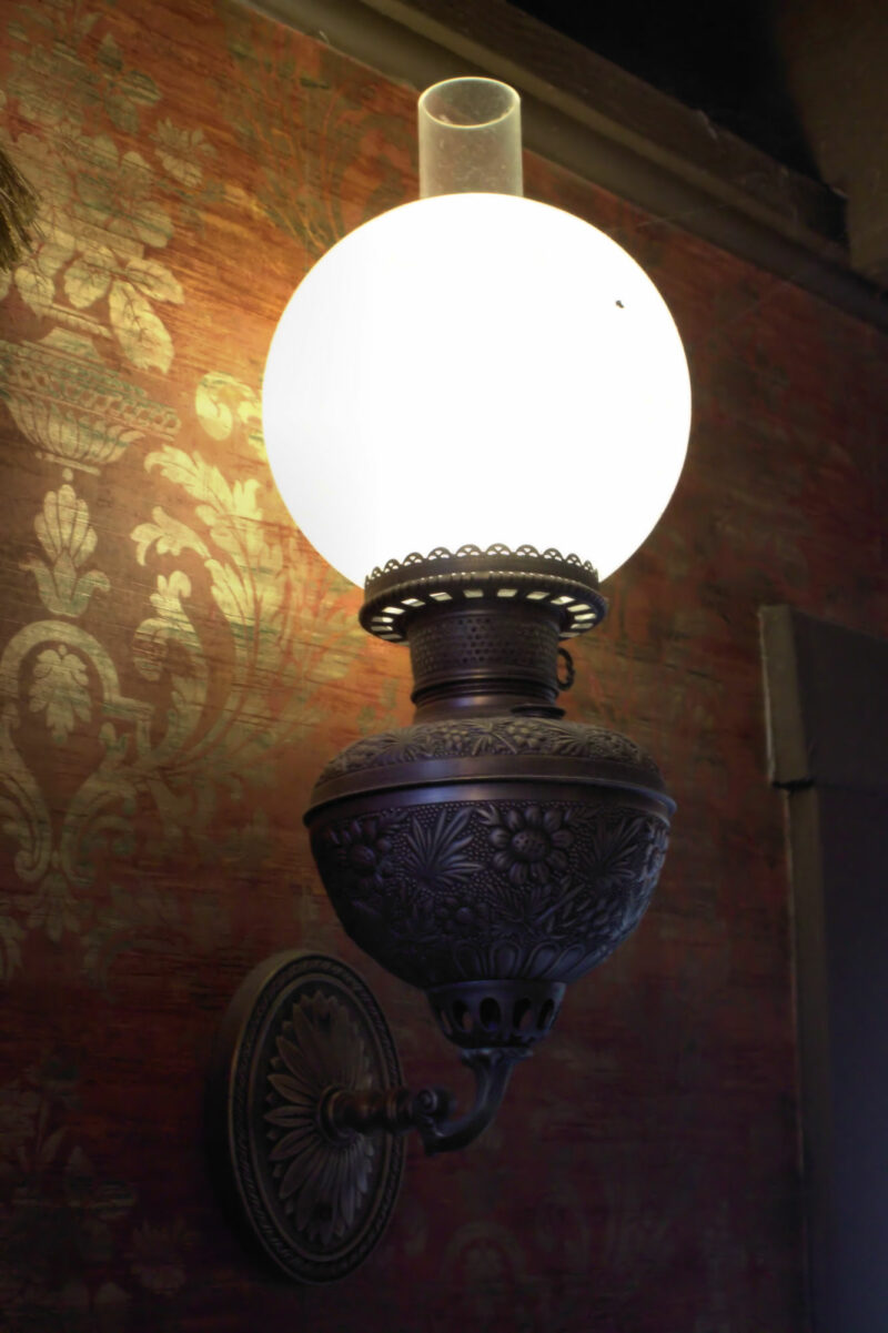 Calico Saloon Knotts Berry Farm Wall Lamps with Floral Pressed Founts, and Ball Shades